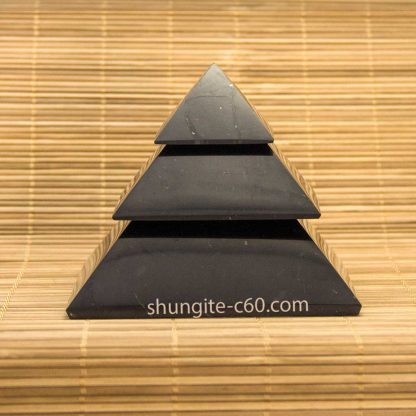 Segmented shungite stone pyramid