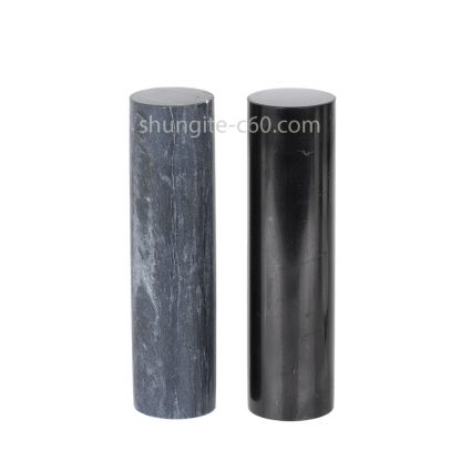 shungite and soapstone cylinders polished surface