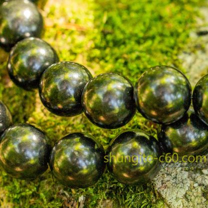 photo of large round beads in nature