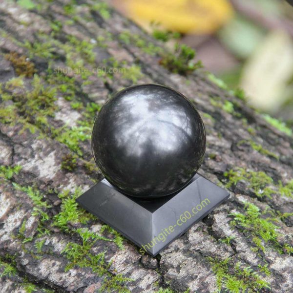 shungite sphere on a square stand