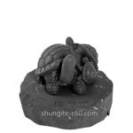 figurine made of shungite turtles