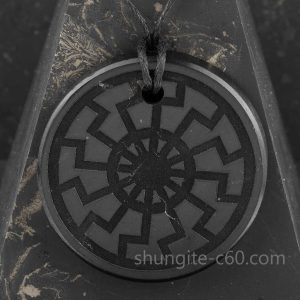 Black Sun pendant made of rare stone