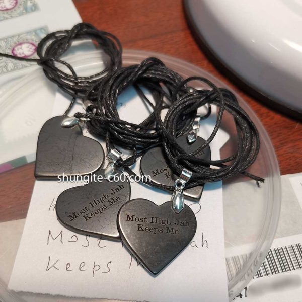 shungite stone heart pendant with engraved text