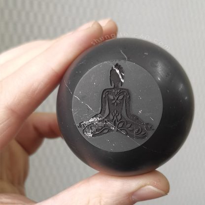 Shungite crystal sphere with Buddha