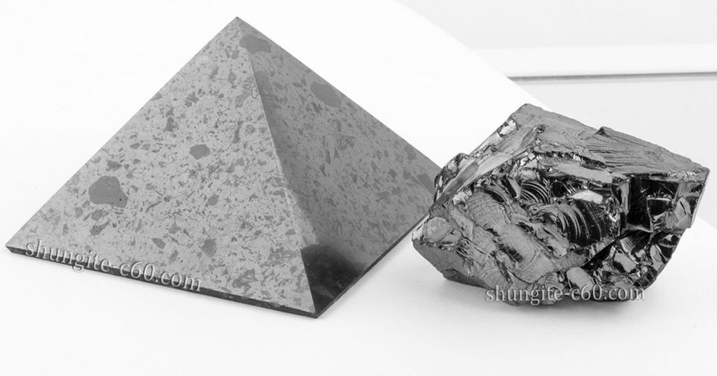 Polished shungite pyramid vs elite shungite stone