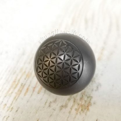 shungite sphere engraved flower from karelia