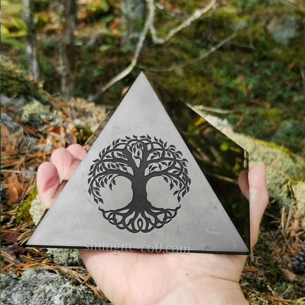 Celtic Tree of Life symbol on a shungite stone pyramid
